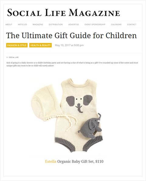 Organic baby gift set with knit bonnet hat, elephant baby toy and knit sunsuit by Estella in Social Life magazine